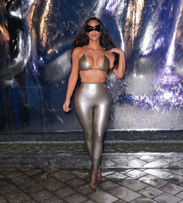 Kim Kardashian Is a Metallic Diva in a Matching Silver Bikini Top and  Leggings