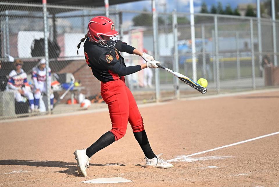 Oakdale’s Morgan Wright drives in the tying run in the 5th inning during the Valley Oak League game with Kimball in Oakdale, Calif., Thursday, May 4, 2023. Oakdale won the game 5-4 in 8 innings.