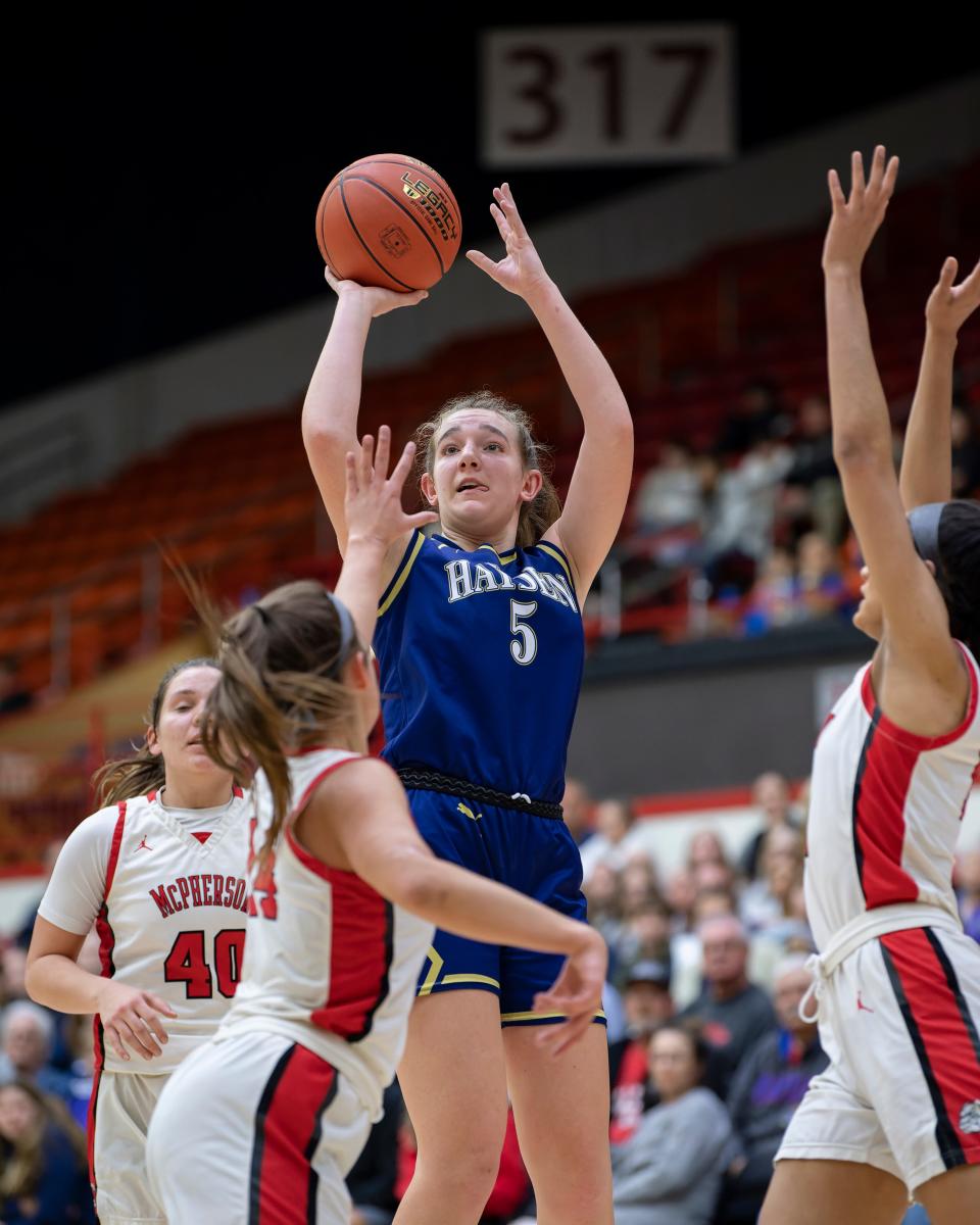 Hayden Lauren Sandstrom (5) shoots the ball Thursday March. 9, 2023, during 4A State Basketball at Tony’s Pizza Events Center in Salina, Kan. 