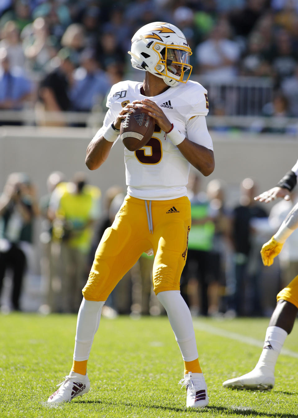 Arizona State quarterback Jayden Daniels looks to throw against Michigan State during the first quarter of an NCAA college football game Saturday, Sept. 14, 2019, in East Lansing, Mich. (AP Photo/Al Goldis)