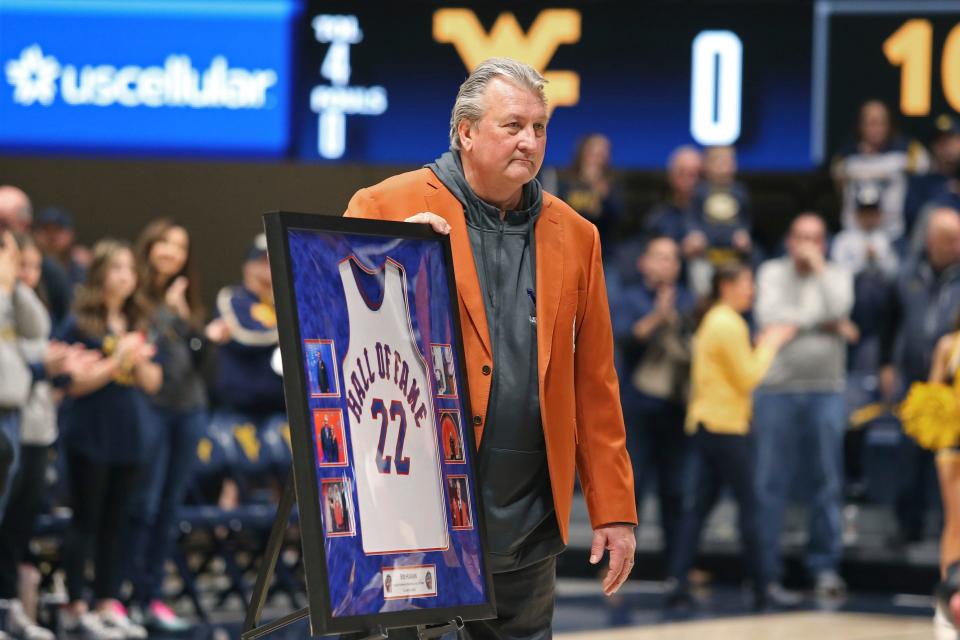 West Virginia coach Bob Huggins is honored during the first half of an NCAA college basketball game against Buffalo in Morgantown, W.Va., Sunday, Dec. 18, 2022. (AP Photo/Kathleen Batten)
