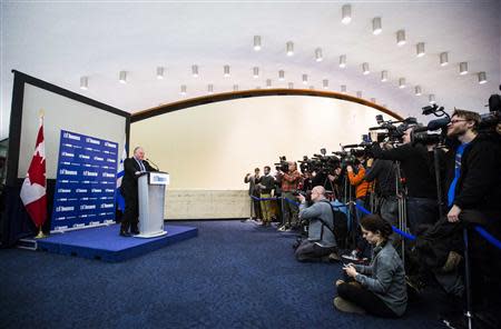 Toronto Mayor Rob Ford makes a statement about his personal life and the Capital and Operating Budgets meeting that had just finished at City Hall in Toronto, January 22, 2014. REUTERS/Mark Blinch