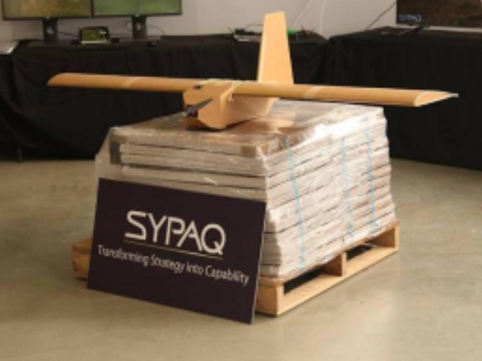 The drone atop a stack of flat-packed versions