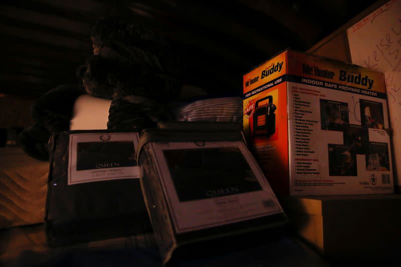 Supplies are stacked to the ceiling in an underground shelter at a survival camp called Fortitude Ranch in southern Colorado