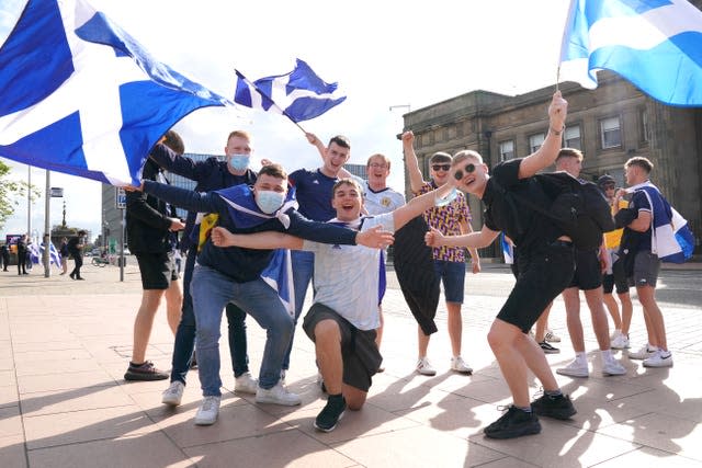 The sun came out for these Scotland fans in Glasgow