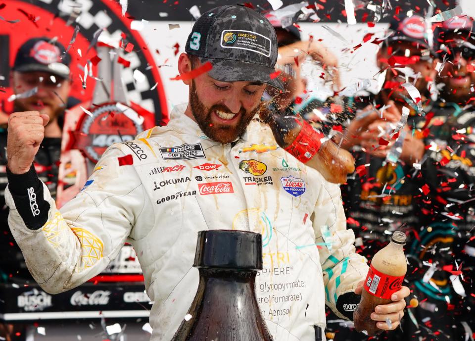 Aug 28, 2022; Daytona Beach, Florida, USA; NASCAR Cup Series driver Austin Dillon (3) celebrate in victory lane after winning the Coke Zero Sugar 400 at Daytona International Speedway.