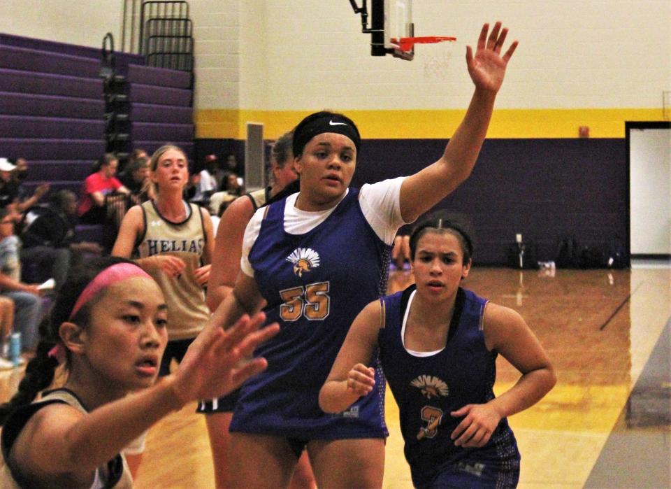 Battle forward Kumani Clark (55) calls for the ball during the Spartans' game against Helias during the 2023 Kewpie Court Shootout on June 10, 2023, at Hickman High School.