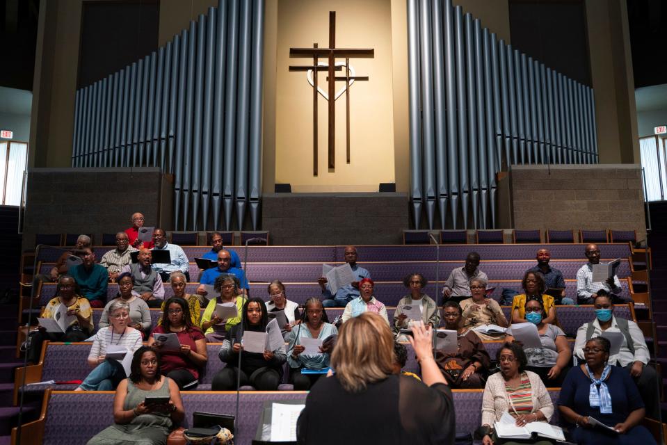 Artistic director Alice McAllister Tillman, 58, of Ann Arbor, center, leads members of the Brazeal Dennard Chorale during a rehearsal at Tabernacle Missionary Baptist Church in Detroit on Tuesday, June 6, 2023.