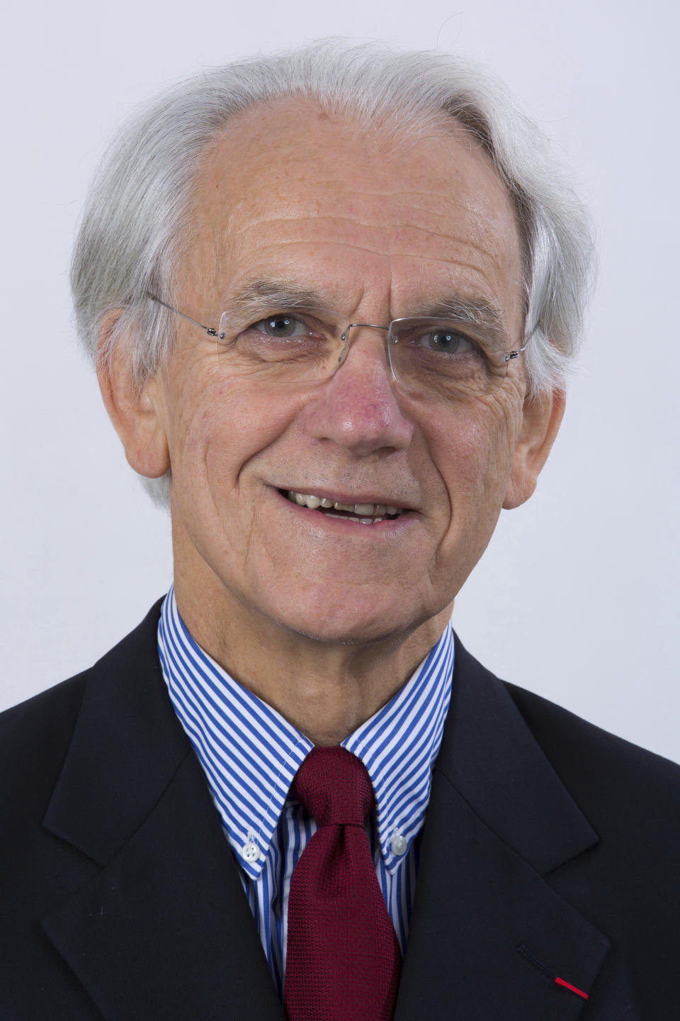 This image dated Nov. 10, 2014 and provided by l'Ecole Polytechnique shows Gerard Mourou posing for a portrait in Palaiseau, France. Three scientists won the Nobel Prize in Physics on Tuesday for their work with lasers. Arthur Ashkin of the United States was awarded half the 9-million-kronor ($1.01 million) prize; the other half is shared by Gerard Mourou of France and Canadian Donna Strickland. (Jeremy Barande/Ecole Polytechnique via AP)