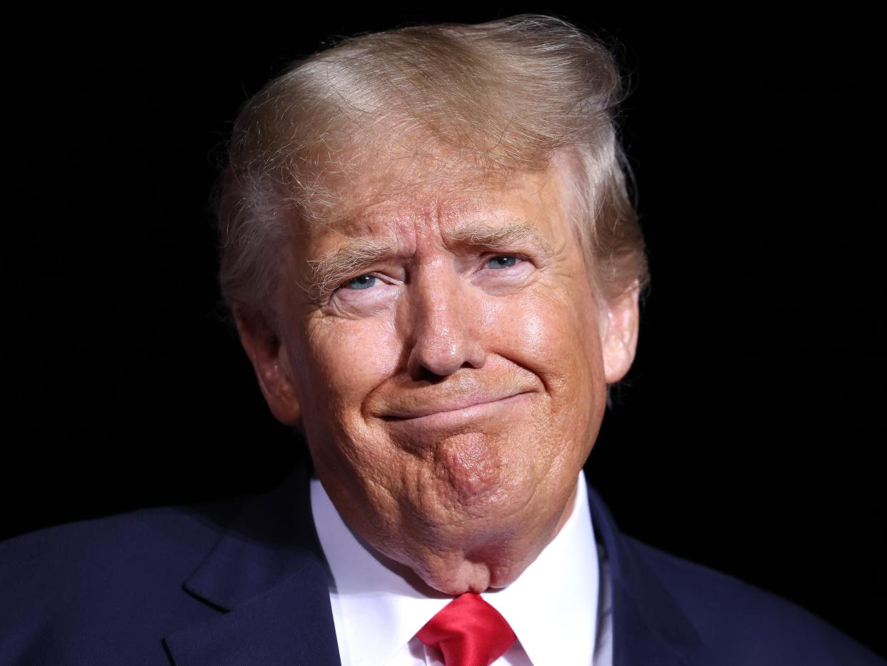 Former U.S. President Donald Trump looks on during a campaign rally at Minden-Tahoe Airport on October 08, 2022 in Minden, Nevada.