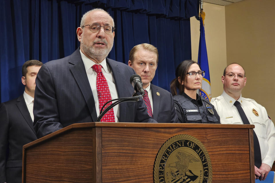 Attorney for Minnesota Andrew Luger speaks at a news conference in Minneapolis on Thursday, March 14, 2024, to announce charges against an alleged straw buyer of the guns used in the killings of three first responders at a home in the Minneapolis suburb of Burnsville in February. (AP Photo/Steve Karnowski)