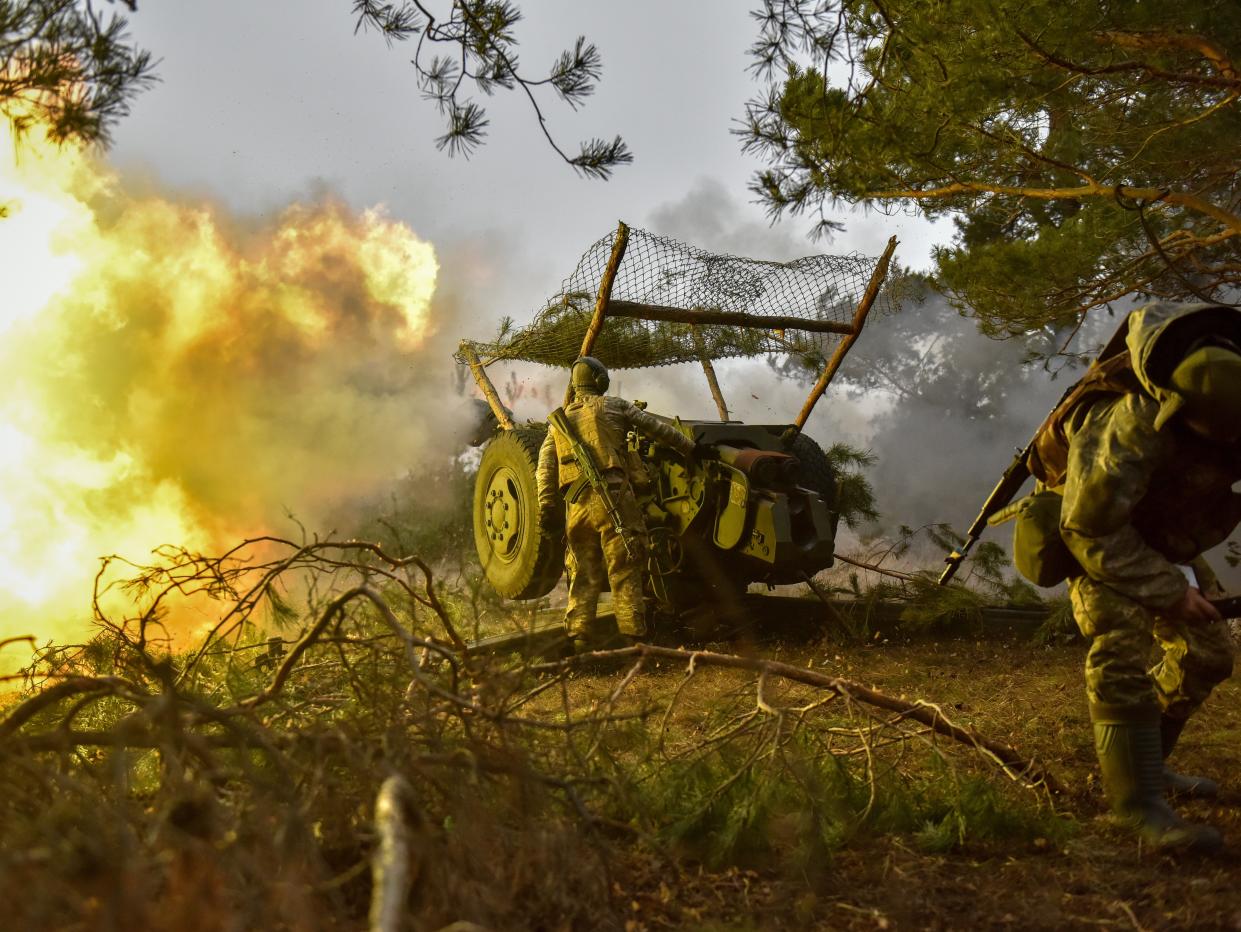 Ukrainian servicemen fire a howitzer towards Russian positions (EPA)