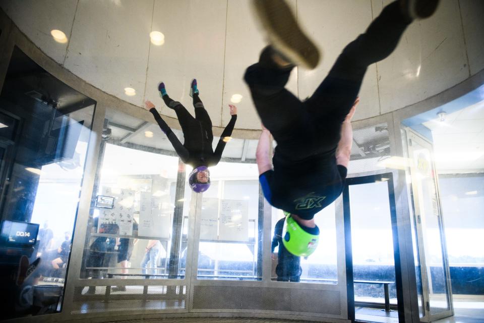 Instructors Courtney McCarthy and David Nance do some skilled moves while indoor skydiving at Paraclete XP on Wednesday, Nov. 4, 2020.