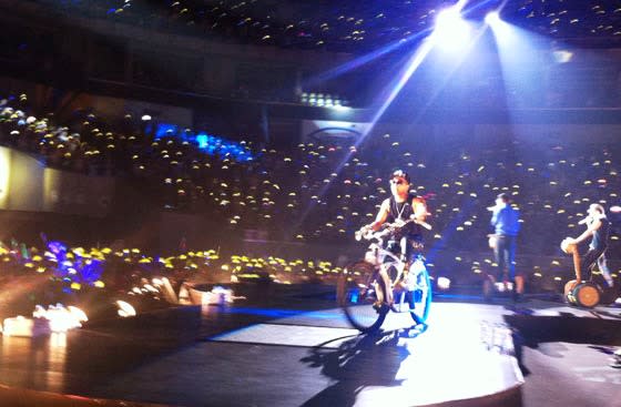 Big Bang member Taeyang enters the stage on a motorbike at the Big Bang Alive Galaxy Tour in Manila on Oct. 24 at the Mall of Asia Arena. (Photo by Erikson Tan)