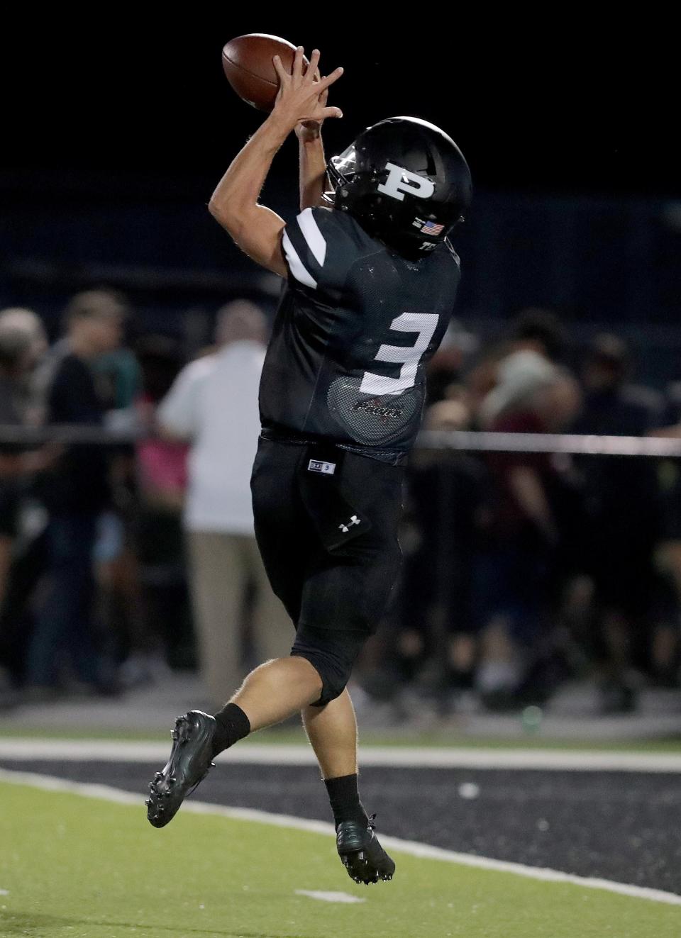 Perry's Carson Basham makes a TD catch against Central Catholic in a 2022 home game.