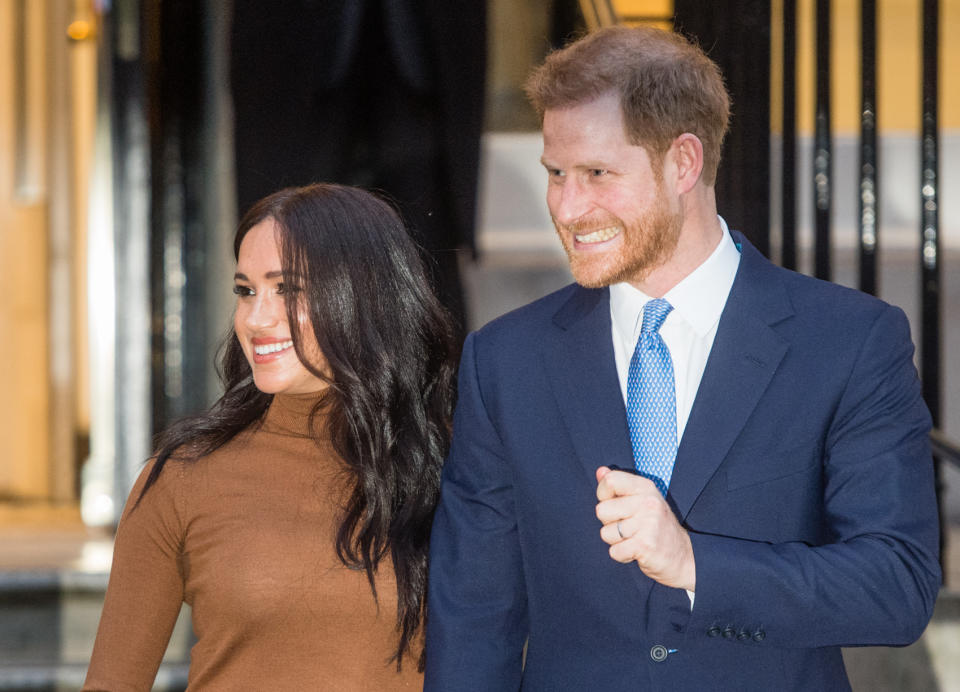 Meghan Markle and Prince Harry smiling at Canada House