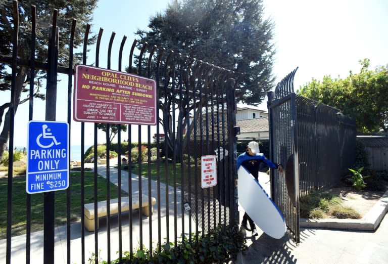 At Privates Beach in the Opal Cliffs area of Santa Cruz, California, there is a $100 annual access fee and an imposing gate, even though it is supposed to be a public beach