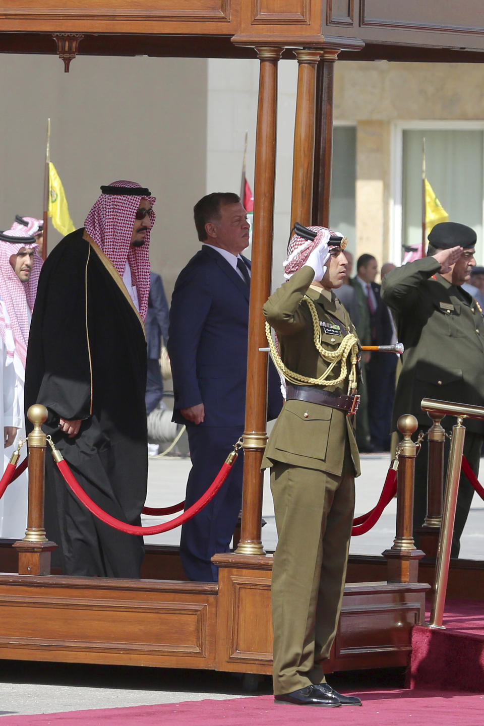 Saudi Arabia's King Salman, left, reviews an honor guard with Jordan's King Abdullah II in a lavish welcome ceremony complete with cannon salutes and guards on camel back, Amman Jordan, Monday, March 27, 2017. Salman is in Jordan to attend the annual Arab Summit, to be held on Wednesday. Issues on the summit agenda include conflicts in Syria, Libya and Yemen. Saudi Arabia is an important financial backer of Jordan. (AP Photo/ Raad Adayleh)