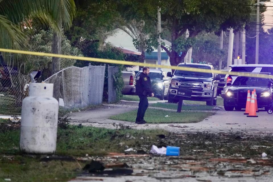 First responders work the scene of house explosion early Tuesday, Dec. 19, 2023 in West Park, Fla. Investigators were trying to determine the cause that injured four people in the suburb of the Fort Lauderdale-Hollywood area.