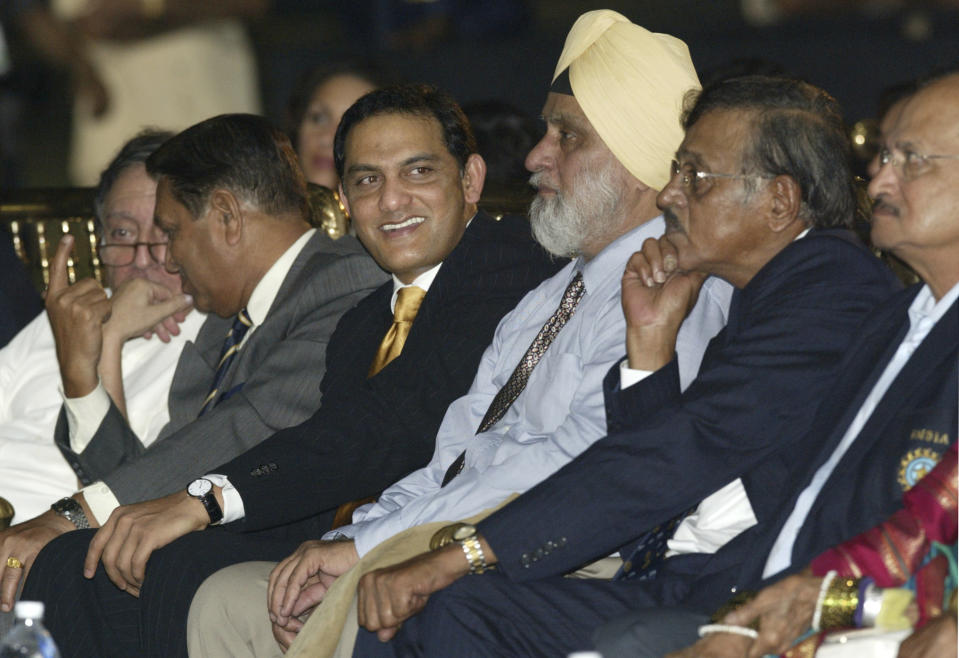 FILE - Former Indian cricket captains, from left, M A K Pataudi, Chandu Borde, Mohammed Azharuddin, Bishan Bedi, S Venkataraghavan and Ajit Wadekar look on at a ceremony where former Indian cricket captains and other cricketing legends were honored by the Board for Control of Cricket in India (BCCI) in Mumbai, India, on Nov. 4, 2006. Bedi, the India cricket great whose dazzling left-arm spin claimed 266 test wickets, has died. He was 77. The death of Bedi, who underwent multiple surgeries over the last two years that included a knee operation a month ago, was confirmed by the Board of Control for Cricket in India on Monday Oct. 23, 2023. (AP Photo/Gautam Singh, File)
