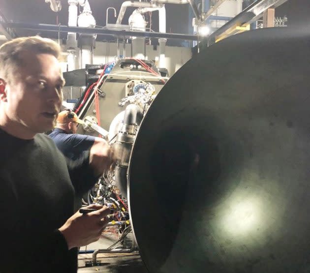 Elon Musk with rocket engine