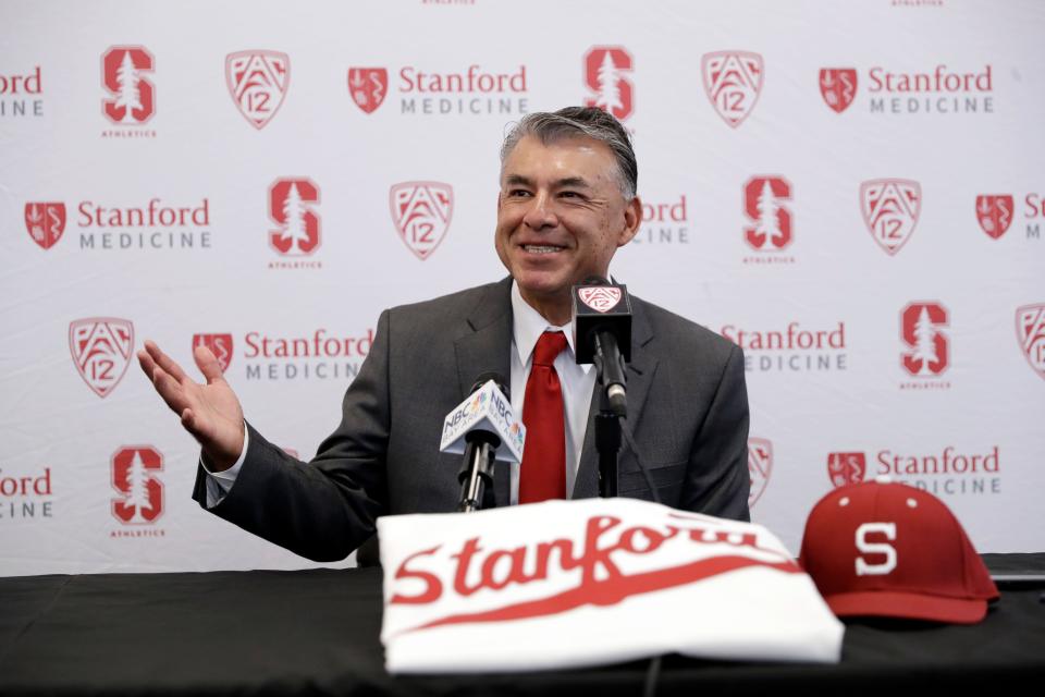 FILE - In this June 20, 2017, file photo, David Esquer fields questions during a press conference introducing him as the new head coach of the Stanford NCAA college baseball team, in Stanford, Calif. First-year coach David Esquer has Stanford off to a 17-2 start after a sweep of Southern California in its opening Pac-12 series. The Cardinal outscored USC 34-2 in the three games, including 18-0 on Sunday, March 25, 2018.(AP Photo/Marcio Jose Sanchez)