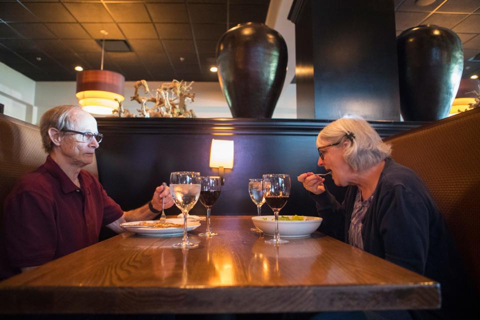 Robert Davis, left, and Barbara Davis dine at Capers & Lemons during the restaurants first day back with dine-in service Monday, June 1, 2020. 