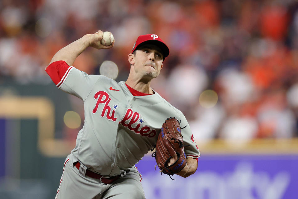 HOUSTON, TEXAS - OCTOBER 28: David Robertson #30 of the Philadelphia Phillies pitches in the 10th inning against the Houston Astros in Game One of the 2022 World Series at Minute Maid Park on October 28, 2022 in Houston, Texas.  (Photo by Carmen Mandato/Getty Images)