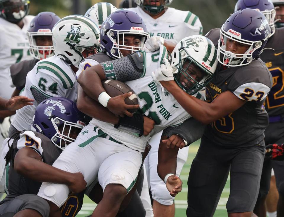 Northwestern defense brings down Dutch Fork’s Kaden Muller Friday, Aug. 11, 2023 in Rock Hill, S.C.