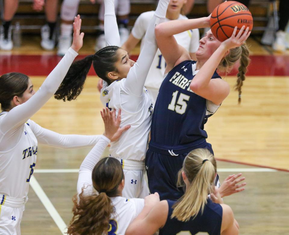 Fairfield's Brea Garber (15) takes a shot in traffic during the IHSAA Regional Finals Saturday, Feb. 11, 2023 at Jimtown High School.