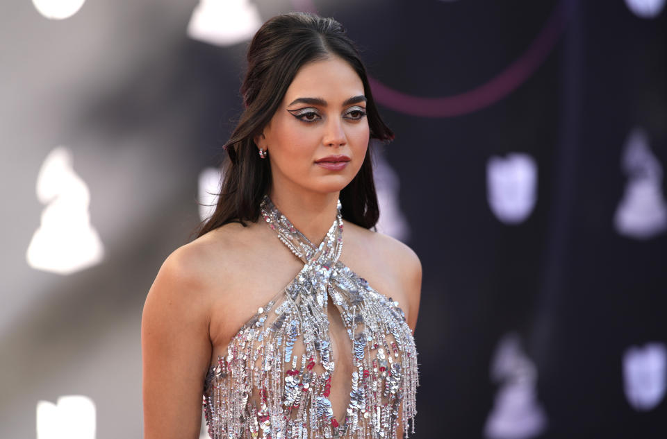 FILE - Melissa Barrera arrives at the 23rd annual Latin Grammy Awards at the Mandalay Bay Michelob Ultra Arena on Thursday, Nov. 17, 2022, in Las Vegas. Barrera is starring in the film musical "Carmen," a modern-day story loosely inspired by Bizet's 1875 opera. (AP Photo/John Locher, File)