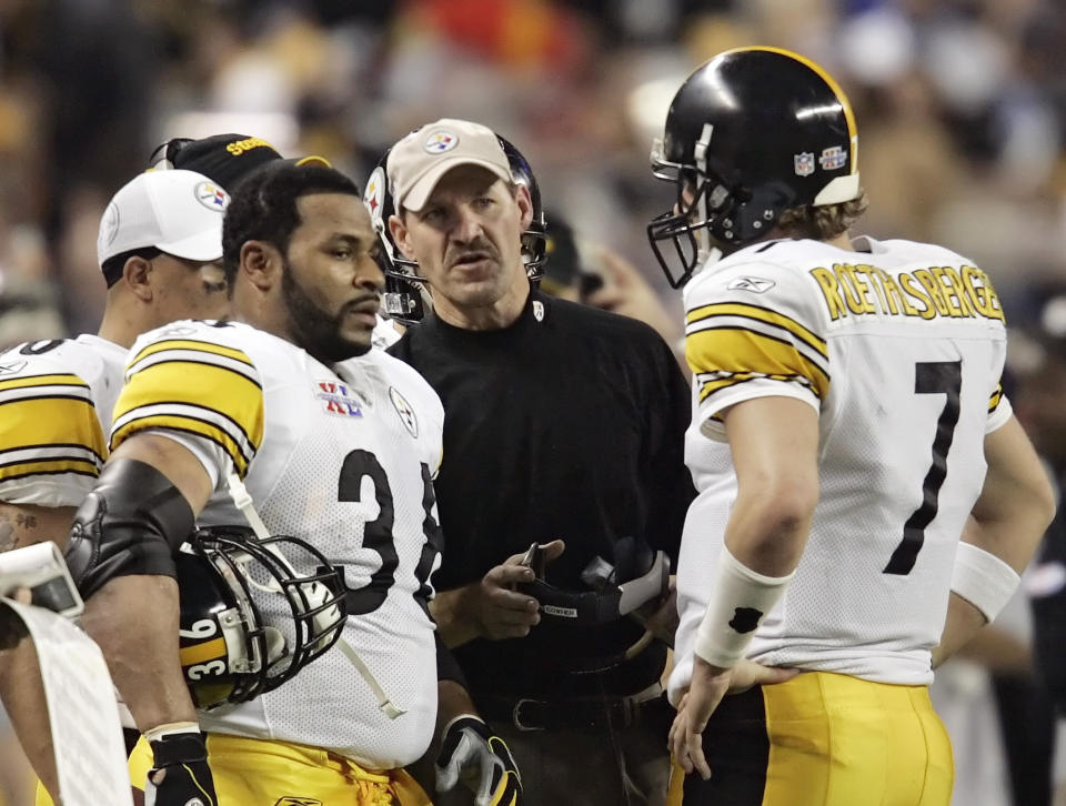 FILE - In this Sunday, Feb. 5, 2006 file photo, Pittsburgh Steelers head coach Bill Cowher talks with Jerome Bettis (36) and quarterback Ben Roethlisberger (7) in the second quarter against the Seattle Seahawks in the Super Bowl XL football game in Detroit. Former Pittsburgh Steelers coach Bill Cowher has been elected to the Pro Football Hall of Fame. Cowher, an analyst for CBS, was surprised by the announcement made live on air in studio before the Tennessee Titans-Baltimore Ravens AFC divisional round playoff game Saturday night, Jan. 11, 2020. (AP Photo/David J. Phillip)