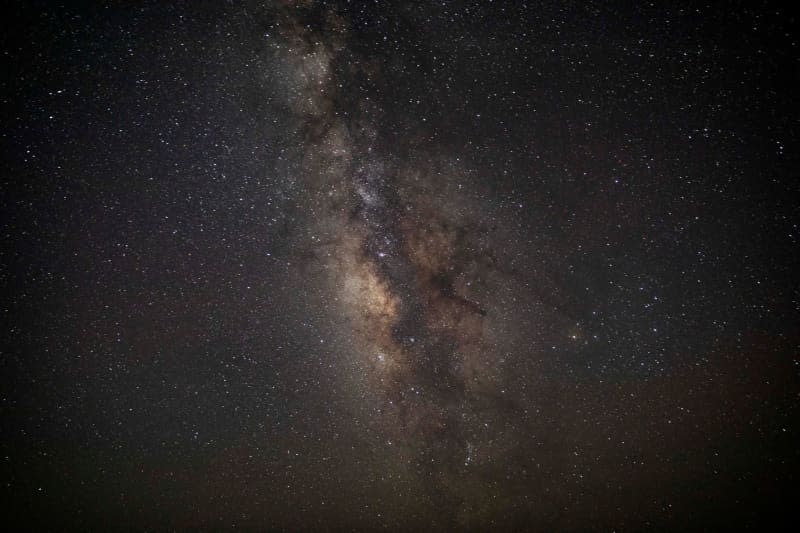 The Milky Way galaxy appears in the sky above the natural reserve area of Wadi Al-Hitan (Valley of the Whales) at the desert of Al Fayoum Governorate. Astronomers discover the Milky Way's most massive stellar black hole Gehad Hamdy/dpa