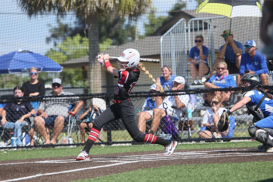 Scenes from Evangelical Christian School softball 11-0 win over Lakeland Christian during a regional playoff game at ECS on Friday, May 19, 2023. ECS' Makayala Jakubuwski collects a hit.