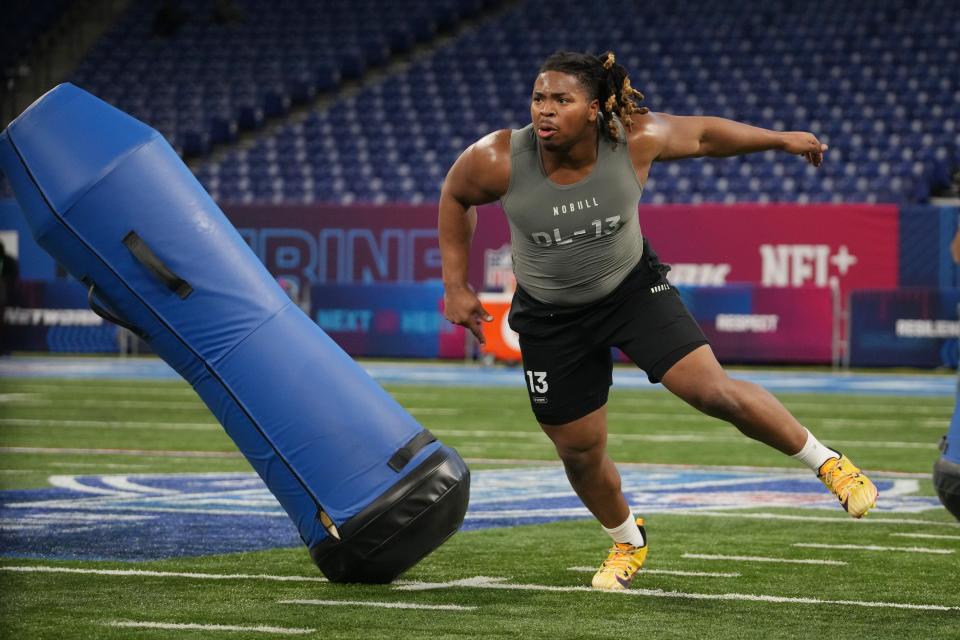 Feb 29, 2024; Indianapolis, IN, USA; Michigan defensive lineman Kris Jenkins (DL13) works out during the 2024 NFL Combine at Lucas Oil Stadium. Mandatory Credit: Kirby Lee-USA TODAY Sports