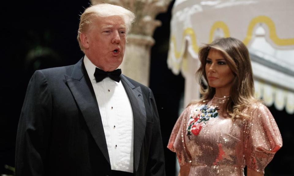 Donald and Melania Trump arrive for a New Year’s Eve gala at Mar-a-Lago.