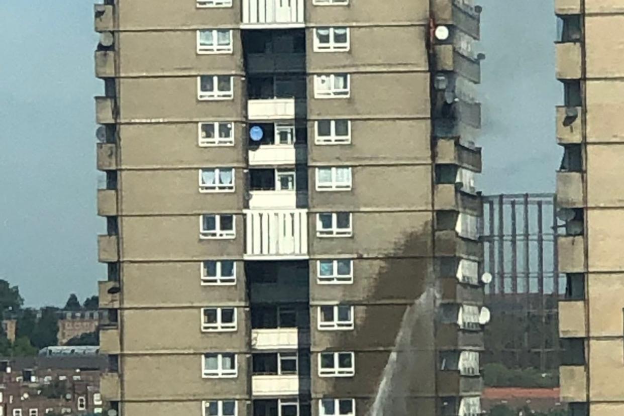 Smoke was seen pouring from the tower block on Darfield Way, W10: Danielle Bond