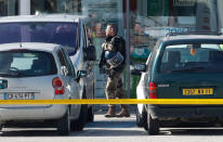 <p>A gendarme seen on the parking lot outside the Super U supermarket where a gunman claiming allegiance to the Islamic State (IS) holding hostages in Trèbes, southern France, 23 March 2018. French police are launching a raid on the supermaket where a gunman that allegedly pledged alliance to the IS is holding hostages. Police says at least two people died and dozens were injured in Trebes near Carcassonne. (Photo: Guillaume Horcajuelo/EPA-EFE/REX/Shutterstock) </p>