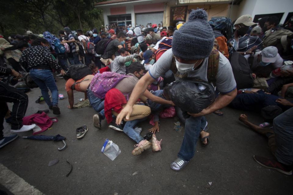 Honduran migrants hoping to reach the U.S. scramble to cross the Honduras-Guatemala border.