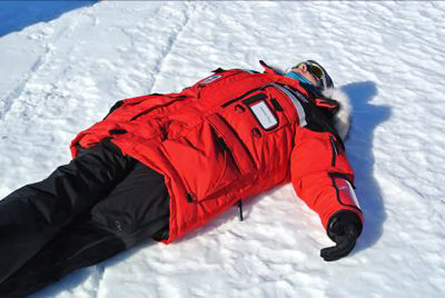 Dr. Ross sunbathes at Union Glacier.