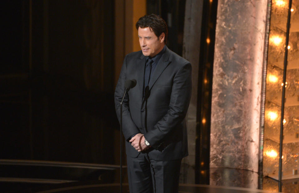 John Travolta on stage during the Oscars in 2014