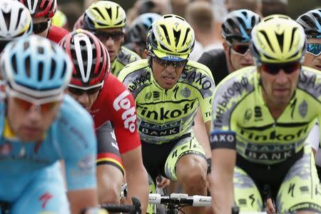 Tinkoff-Saxo rider Alberto Contador of Spain (C) rides in the pack during the 166-km (103.15 miles) second stage of the 102nd Tour de France cycling race from Utrecht to Zeeland, July 5, 2015. REUTERS/Benoit Tessier