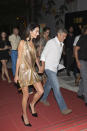 <p>Wearing a Studio 54-esque gold minidress. <i>(Photo by Iconic/GC Images)</i><br></p>