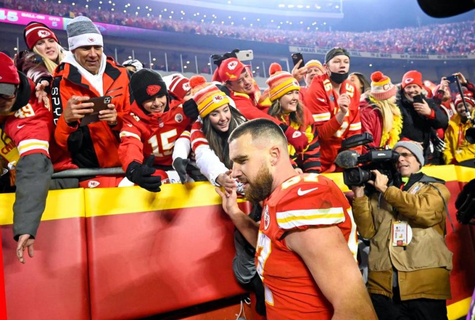 Fans at Arrowhead Stadium celebrate with Chiefs tight end Travis Kelce after his game-winning touchdown against the Buffalo Bills in a Jan. 23 AFC Divisional Round playoff game.