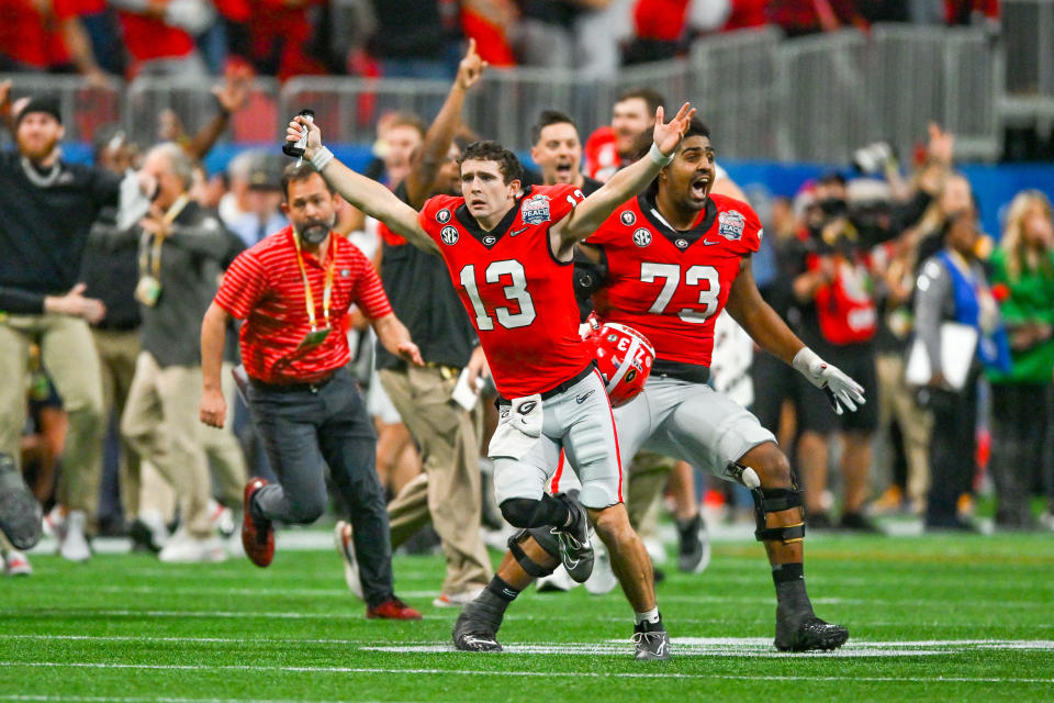 ATLANTA, GA  DECEMBER 31:  Georgia quarterback Stetson Bennett (13) reacts after a missed Ohio State field goal during the Chick-fil-A Peach Bowl college football playoff game between the Ohio State Buckeyes and the Georgia Bulldogs on December 31st, 2022 at Mercedes-Benz Stadium in Atlanta, GA.  (Photo by Rich von Biberstein/Icon Sportswire via Getty Images)