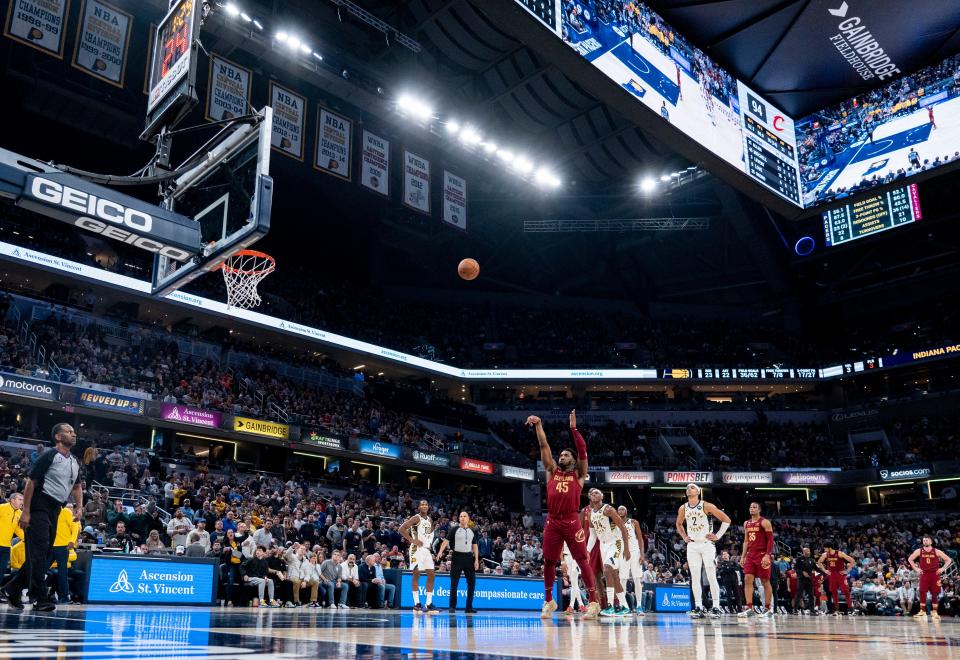 Cleveland Cavaliers guard Donovan Mitchell (45) shoots a free throw Thursday, Dec. 29, 2022, at Gainbridge Fieldhouse in Indianapolis. 