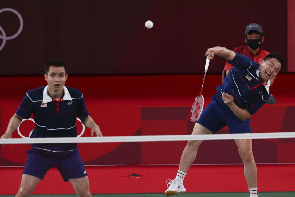 Malaysia’s Aaron Chia and Soh Wooi Yik in action during the Tokyo 2020 Olympics badminton Men’s Doubles bronze medal match against Indonesia’s Mohammad Ahsan and Hendra Setiawan at the Musashino Forest Sport Plaza, Tokyo July 31, 2021. — Reuters pic