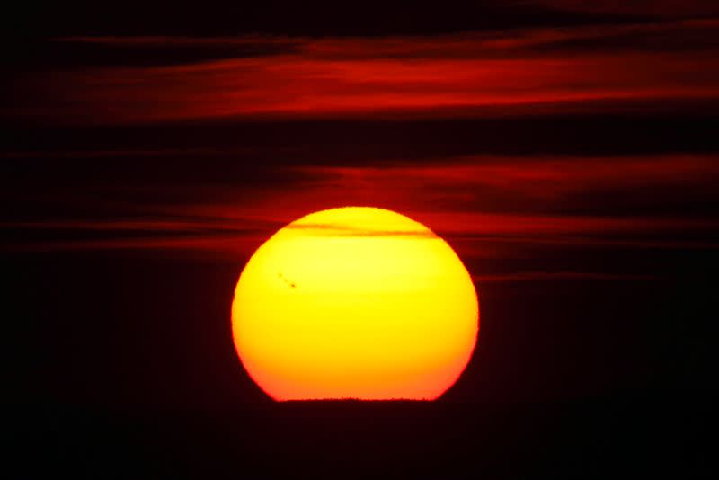 FILE PHOTO: Sunspots are visible during sunset over the island of Cres