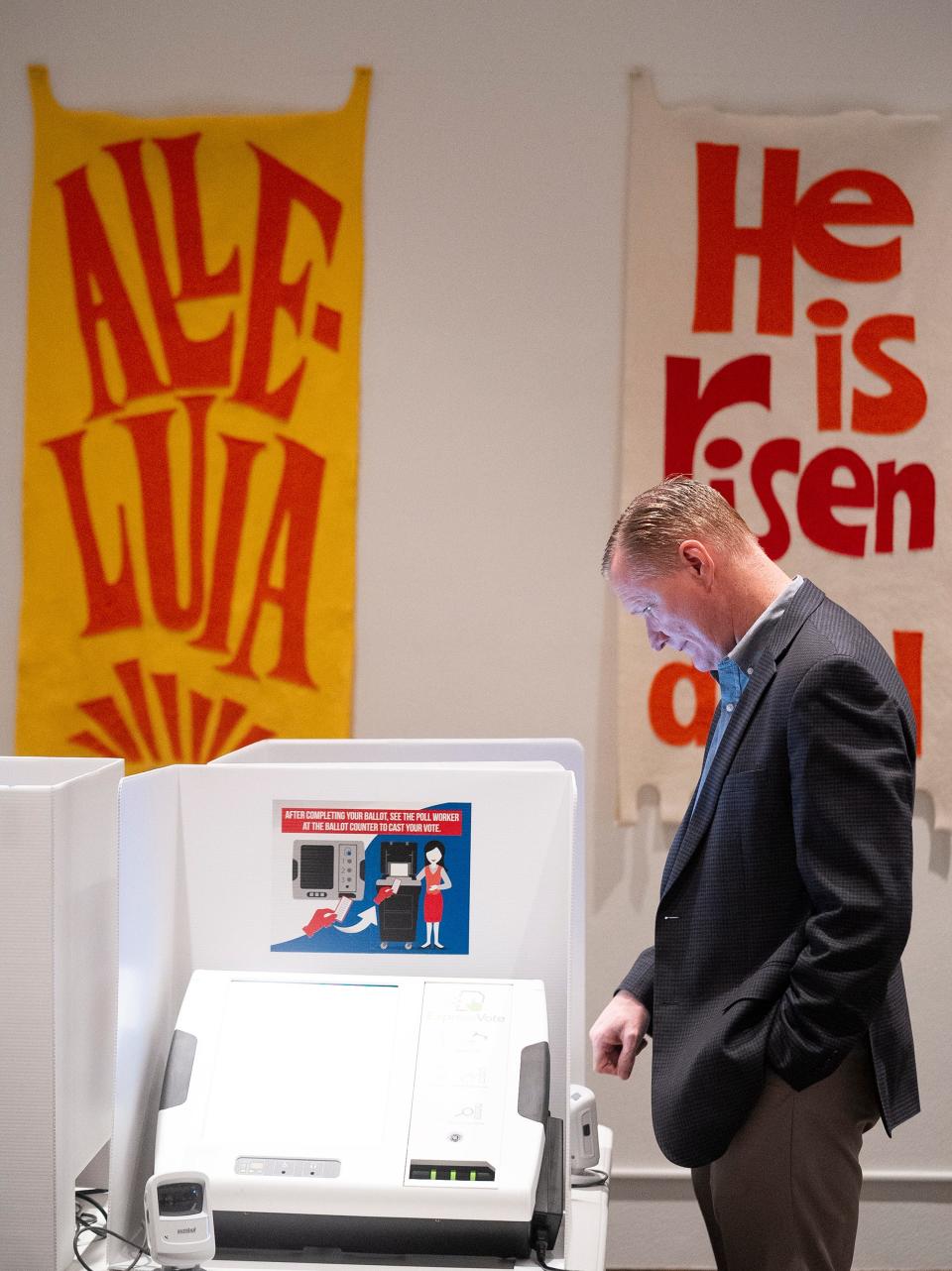 Former Congressman Steve Stivers casts his vote at the First Community Church in Marble Cliff.