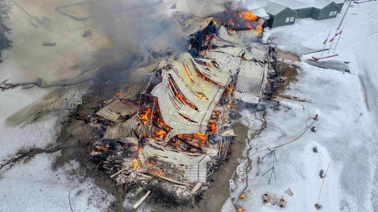 A fire engulfed Eabametoong First Nation's only school last week, affecting students from kindergarten through Grade 9. On Monday, the Nishnawbe Aski Police Service (NAPS) said four teenagers have been charged. (Submitted by Chris Papah - image credit)